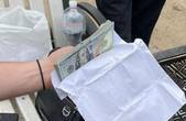 У Чернівцях збували фальшиві банкноти номіналом 20, 50 та 100 доларів США